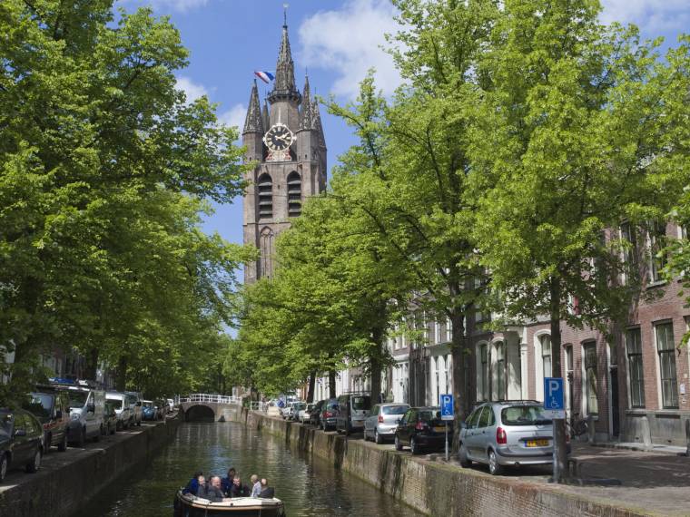 Delft Canal with Old Church © Delftimagebank